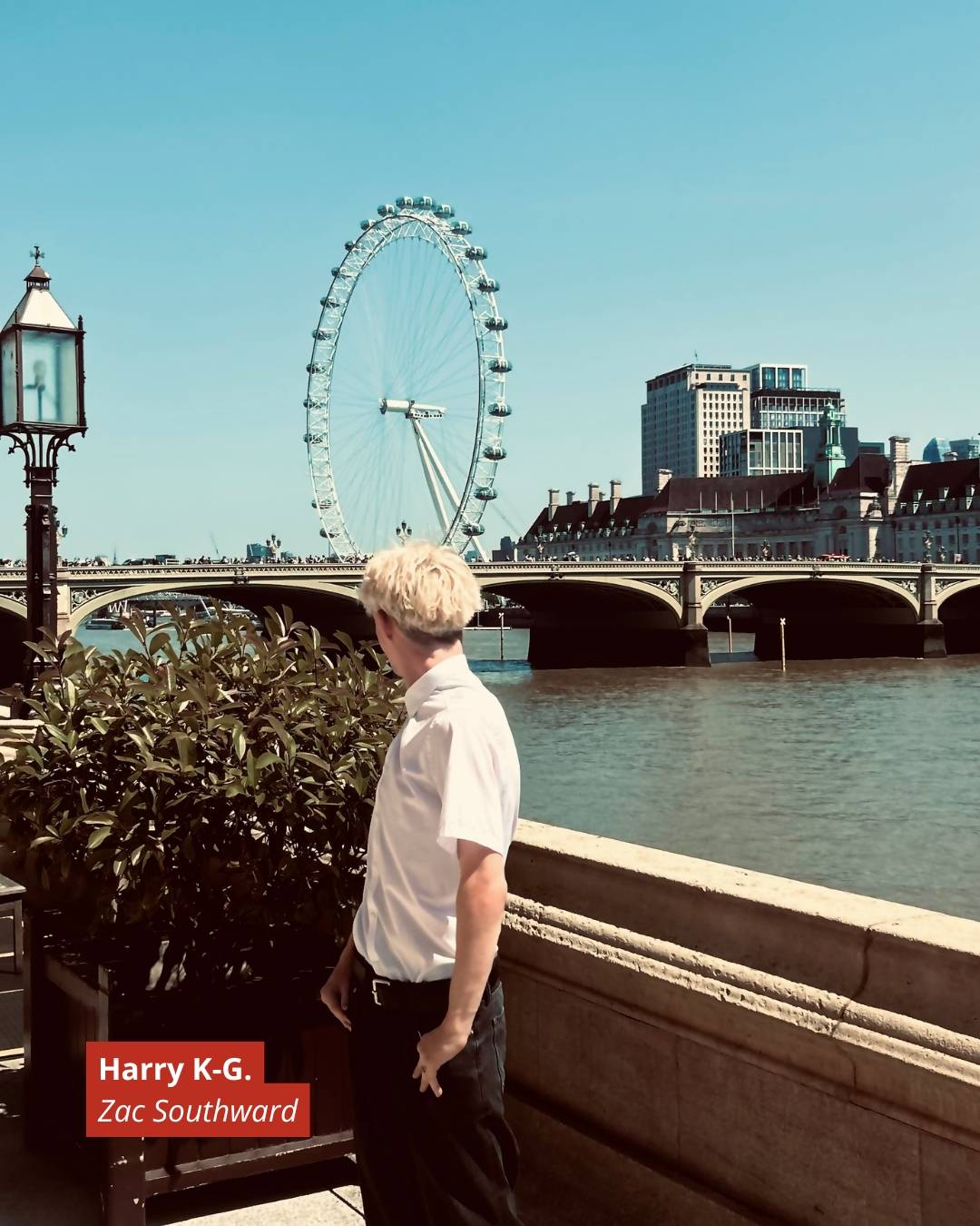 Man in a white shirt stands by the River Thames with the London Eye and a bridge in the background; red caption reads 'Harry K-G. Zac Southward'