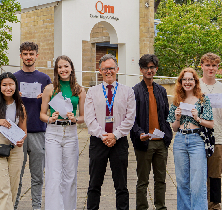 QMC Students pictured celebrating on Results Day