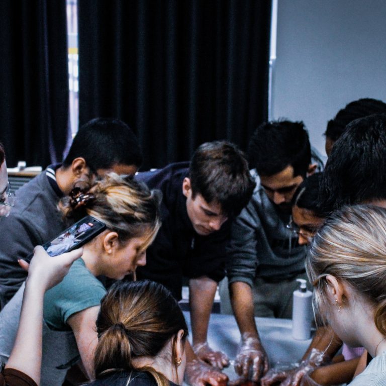 Aspiring medics at Queen Mary's College taking part in a hands-on operating theatre experience.