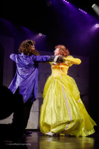 Sarah Tottie as Belle and Thomas Davies in the role of Beast at QMC's Performing Arts Production of Beauty and the Beast