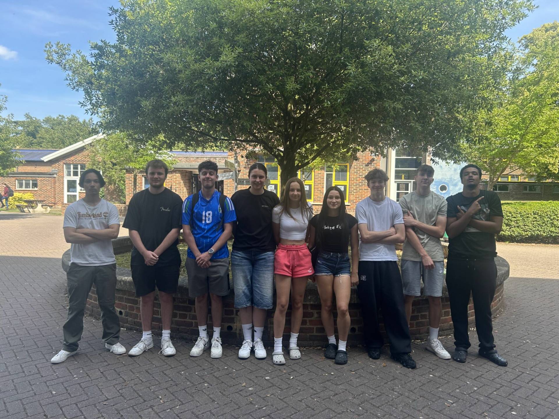 A line of students stood up